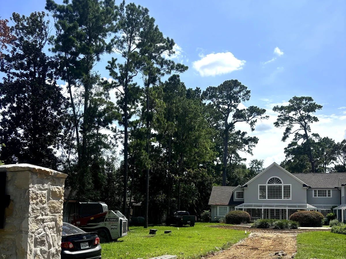 The same property before the pour: old driveway demolished to rubble and dirt ahead of base preparation